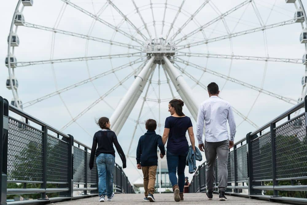 Riding the La Grande Roue is a family activity in Montreal